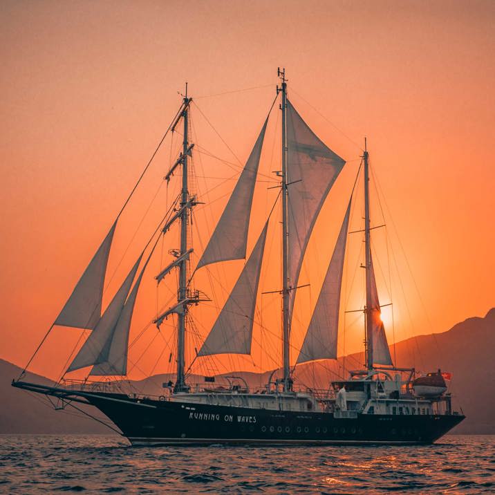 red sunset behind the ship