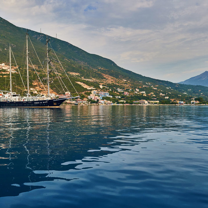 ship next to hilly island