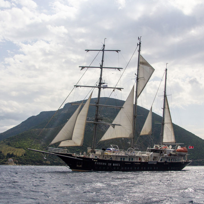 ship next to hilly green island