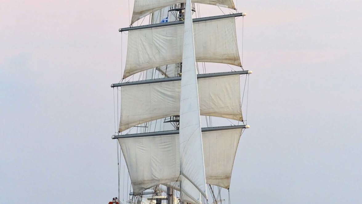 ship at sea at full sails front view